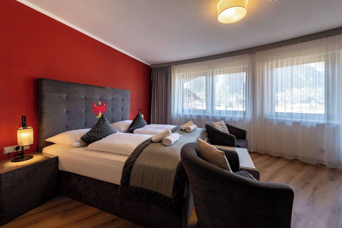 Deluxe Double Room, Balcony, Mountain View | In-room safe, desk, free cribs/infant beds, free rollaway beds