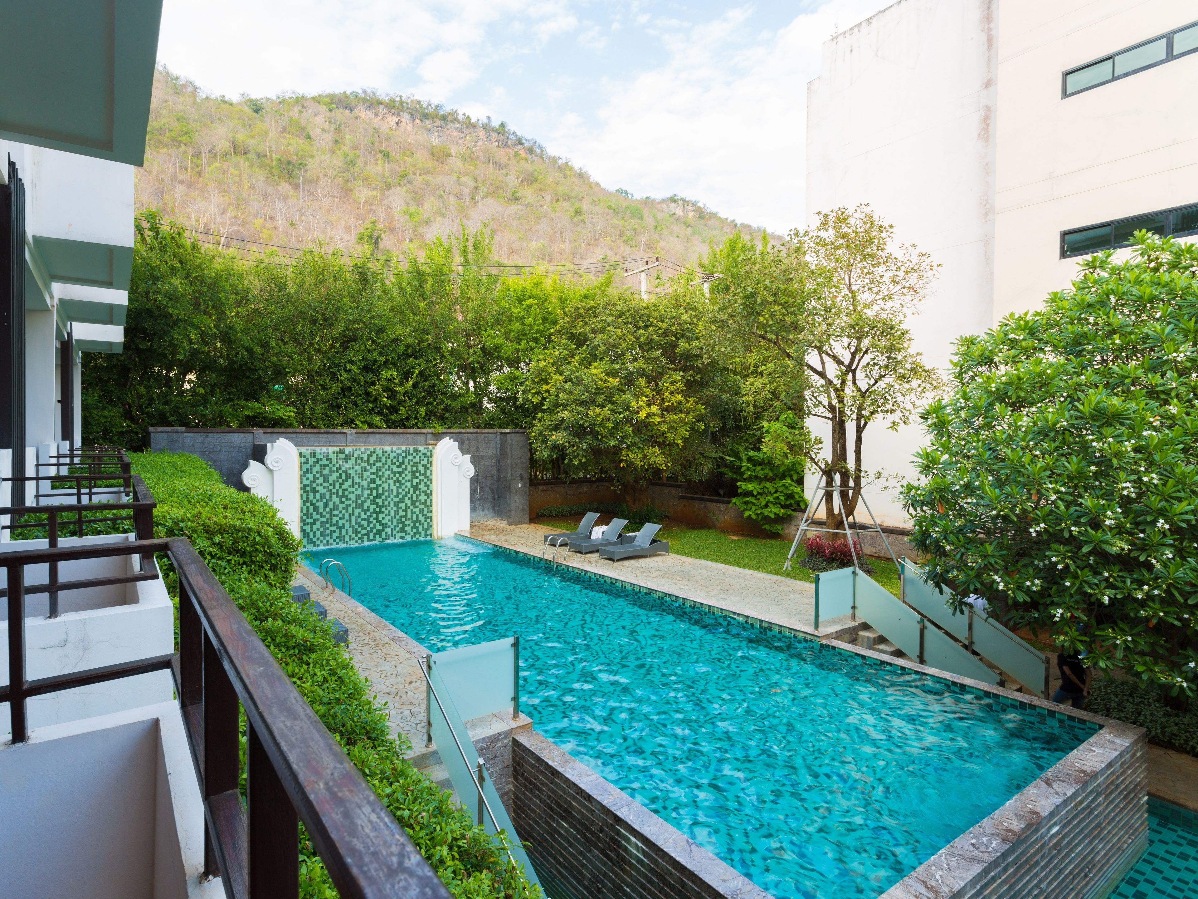 Outdoor pool, open 8:00 AM to 6:00 PM, pool umbrellas, pool loungers