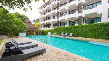 Outdoor pool, open 8:00 AM to 6:00 PM, pool umbrellas, sun loungers