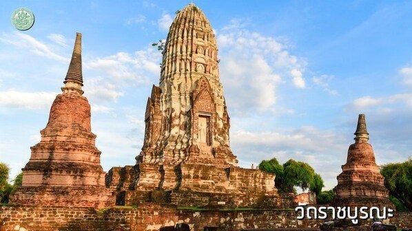 A temple complex with multiple structures, including a central tower and two smaller towers. - Sunday Ayothaya Hotel (Ayutthaya)