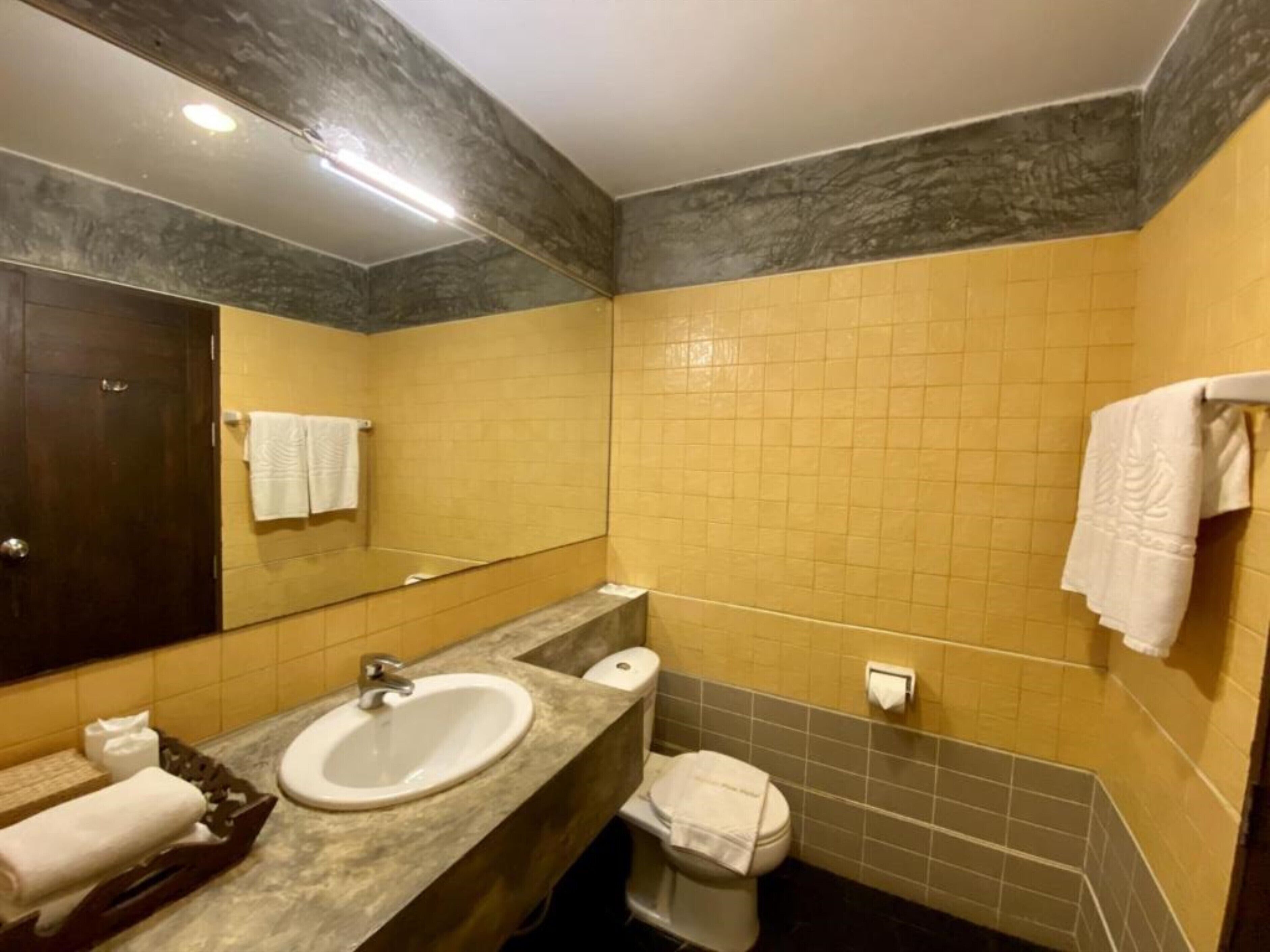 deluxe seaview room | bathroom | shower, free toiletries, hair dryer, slippers