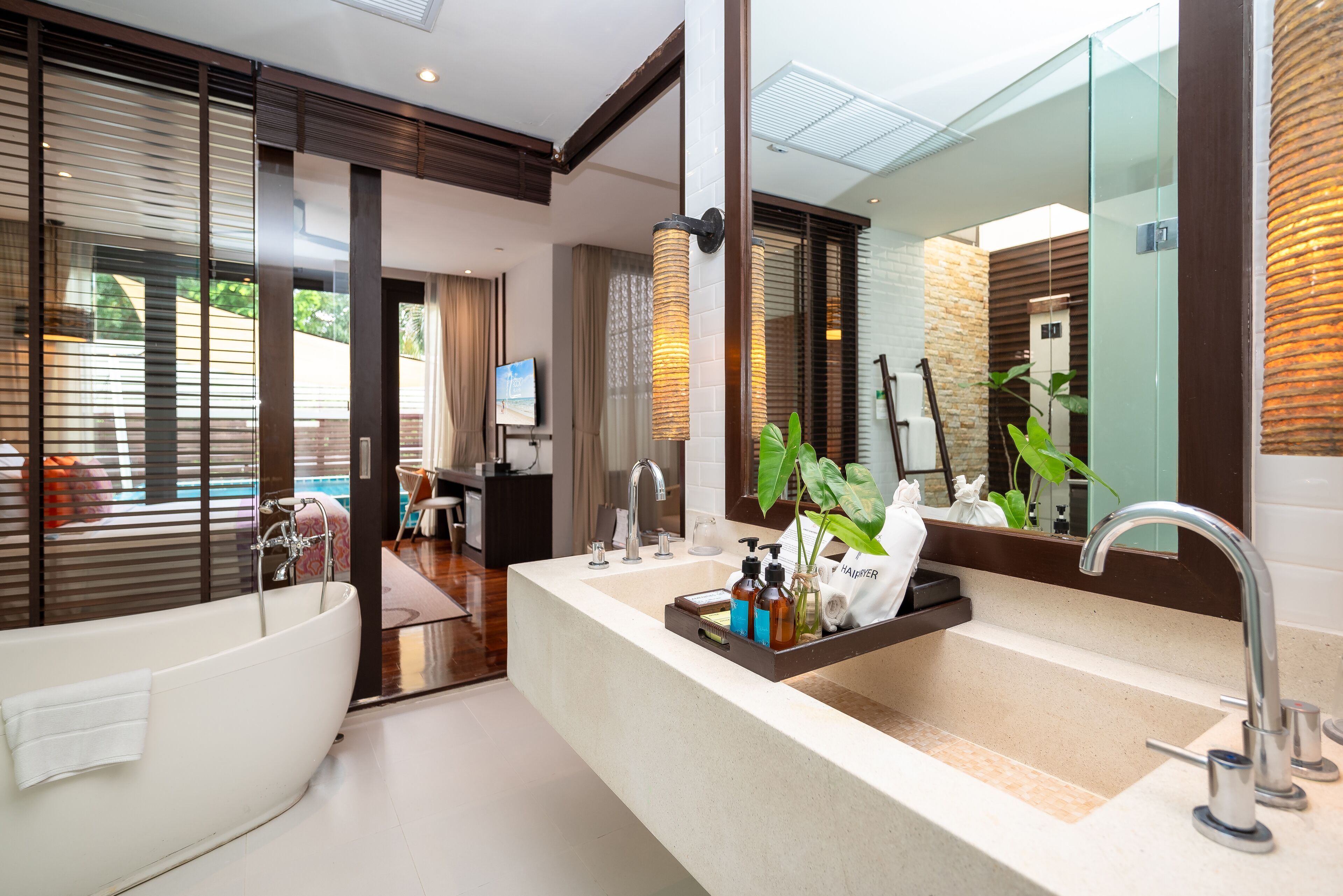 grand family premier pool suite | bathroom | separate bathtub and shower, deep-soaking bathtub, rainfall showerhead