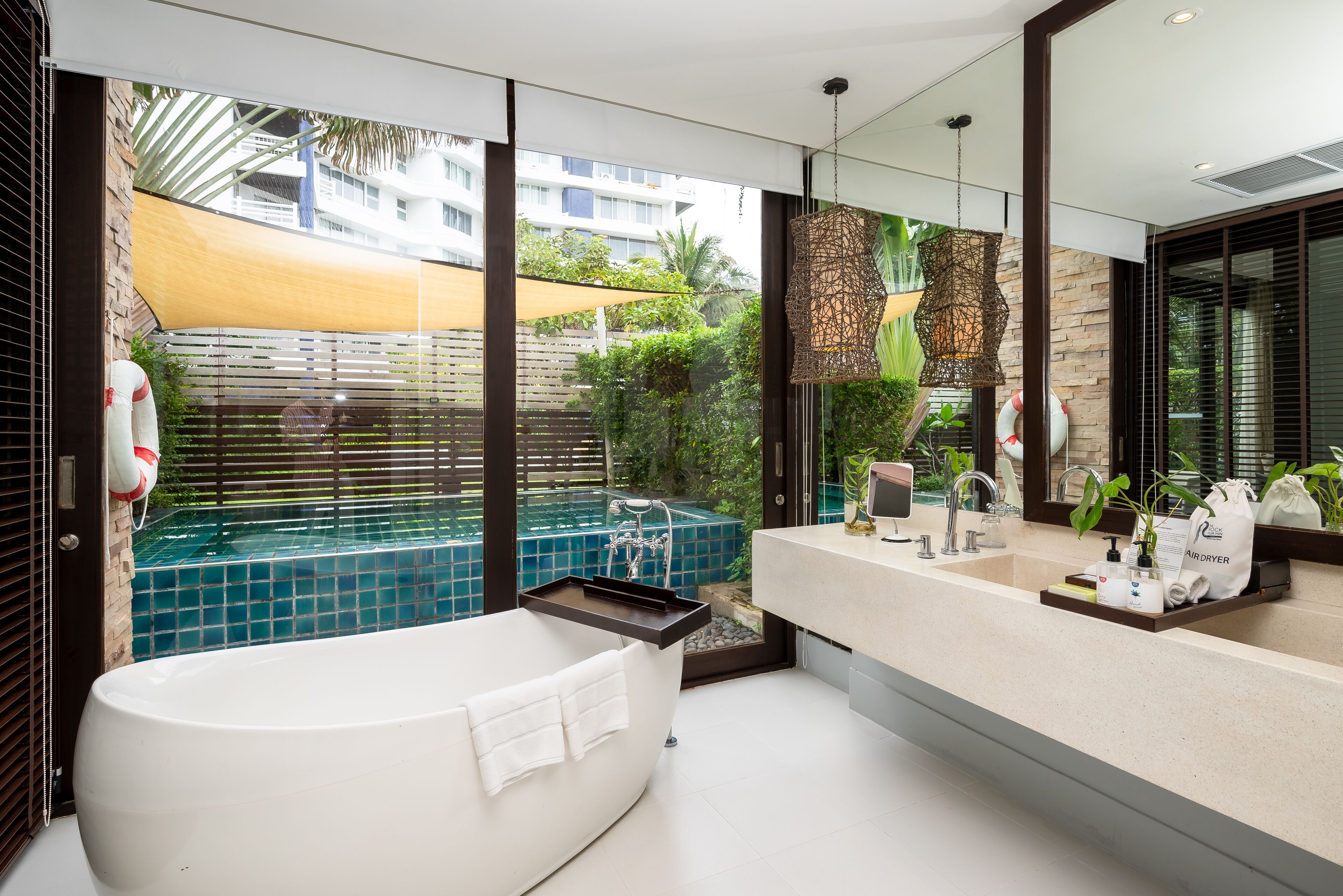 grand family premier pool suite | bathroom | separate bathtub and shower, deep-soaking bathtub, rainfall showerhead