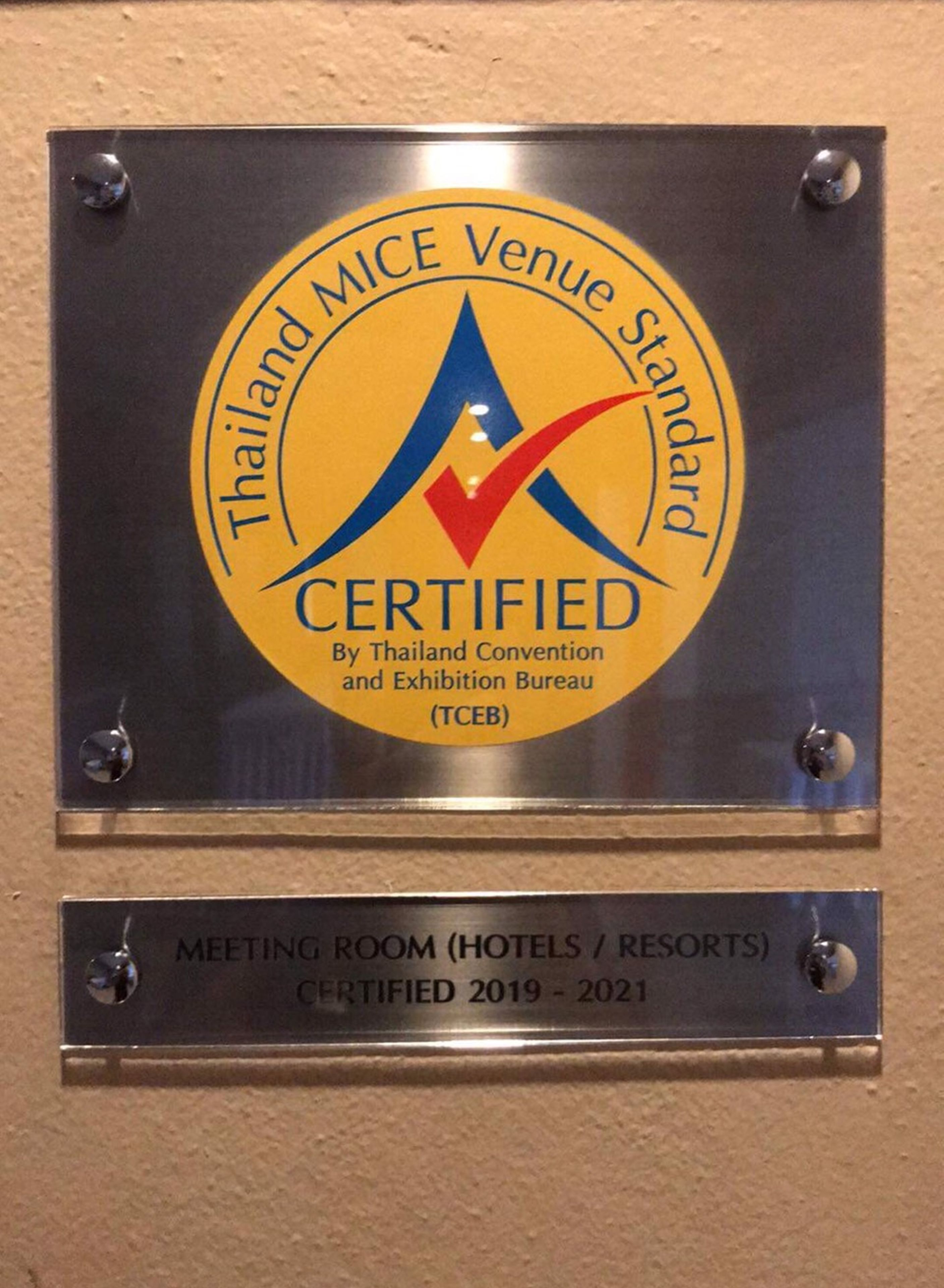 A plaque indicating a meeting room is certified by Thailand Convention and Exhibition Bureau (TCEB) for the years 2019 to 2021.
