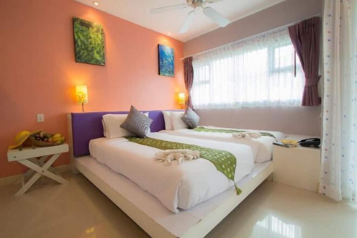 Premium bedding, in-room safe, desk, iron/ironing board (on request)