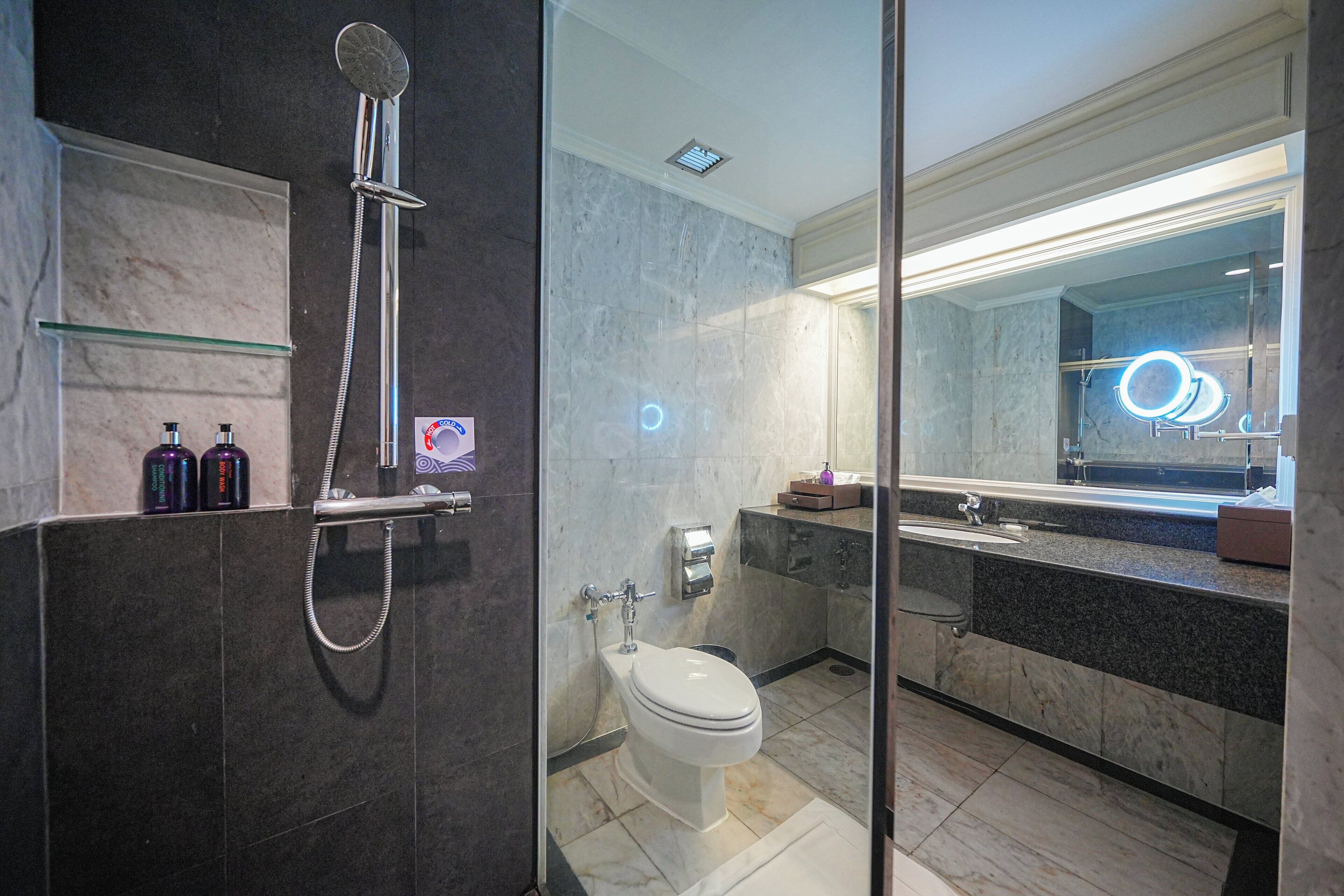 hair dryer, bathrobes, slippers, bidet