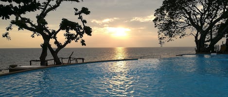 Outdoor pool, pool umbrellas, sun loungers