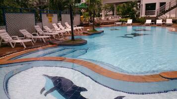 Relax by the pool surrounded by a beautiful mosaic design and comfortable lounge chairs.