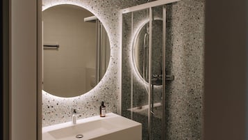Eco-friendly toiletries, hair dryer, towels, soap