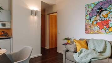 Familienapartment | Wohnbereich | LED-Fernseher