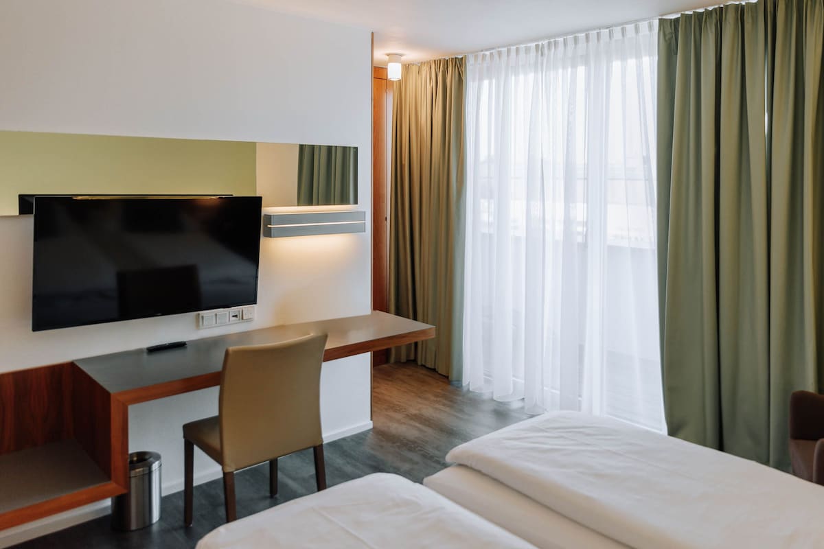 Standard Double Room, Patio | In-room safe, desk, laptop workspace, soundproofing