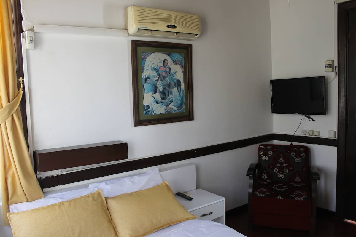 Biancheria da letto di alta qualità, minibar, una scrivania