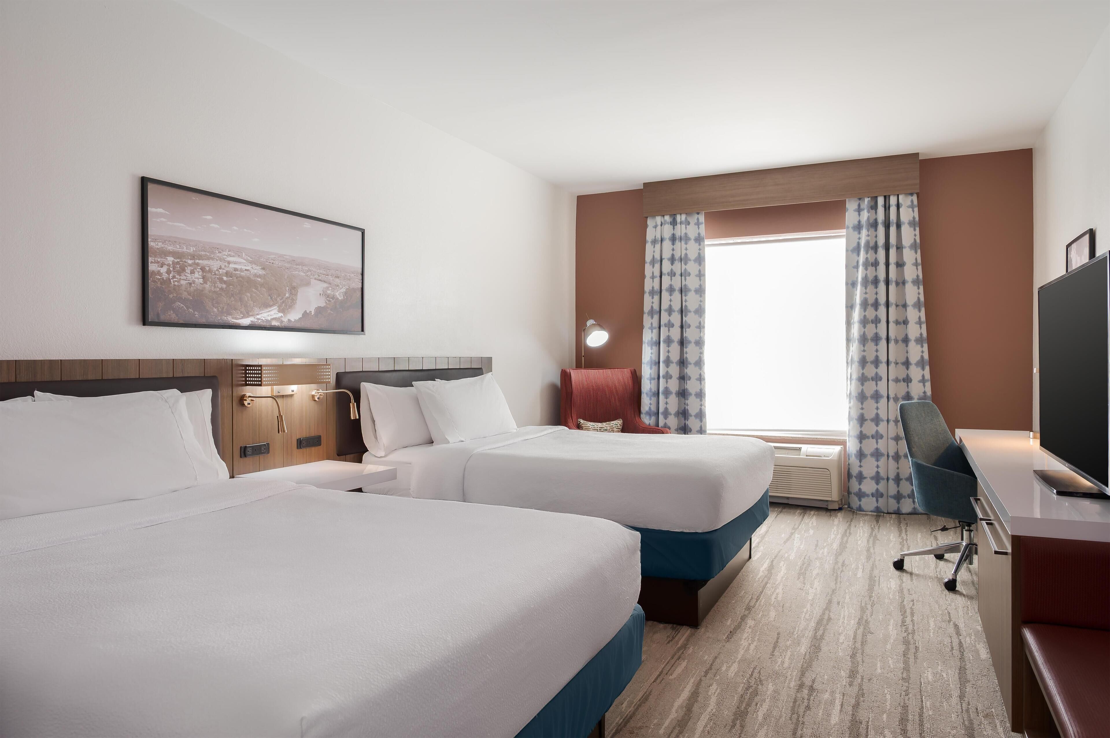 Room, 2 Queen Beds (Evolution) | Blackout drapes, iron/ironing board, free cribs/infant beds, free WiFi