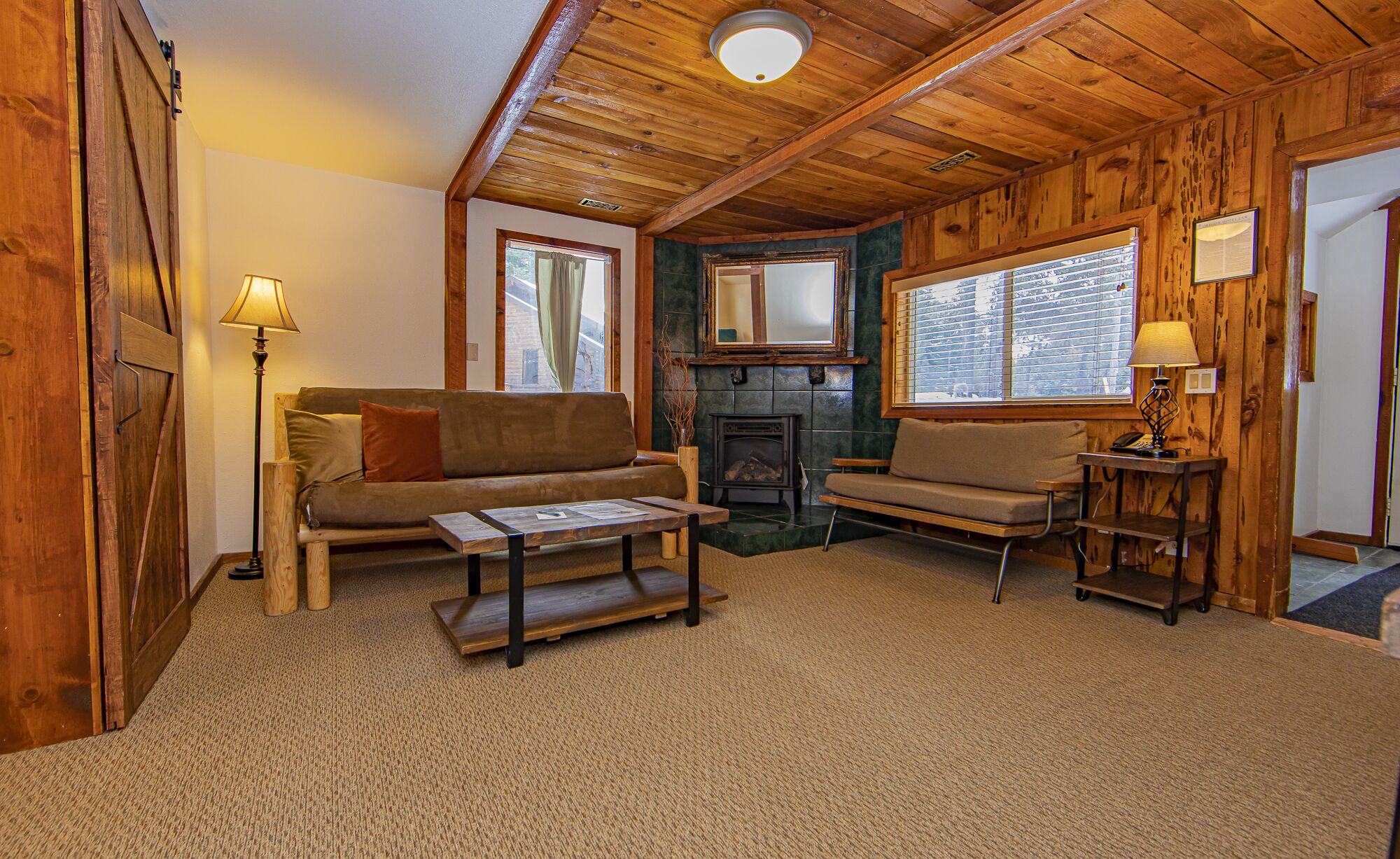 standard cabin, 1 bedroom(pet-friendly) | living area | 32-inch tv with satellite channels