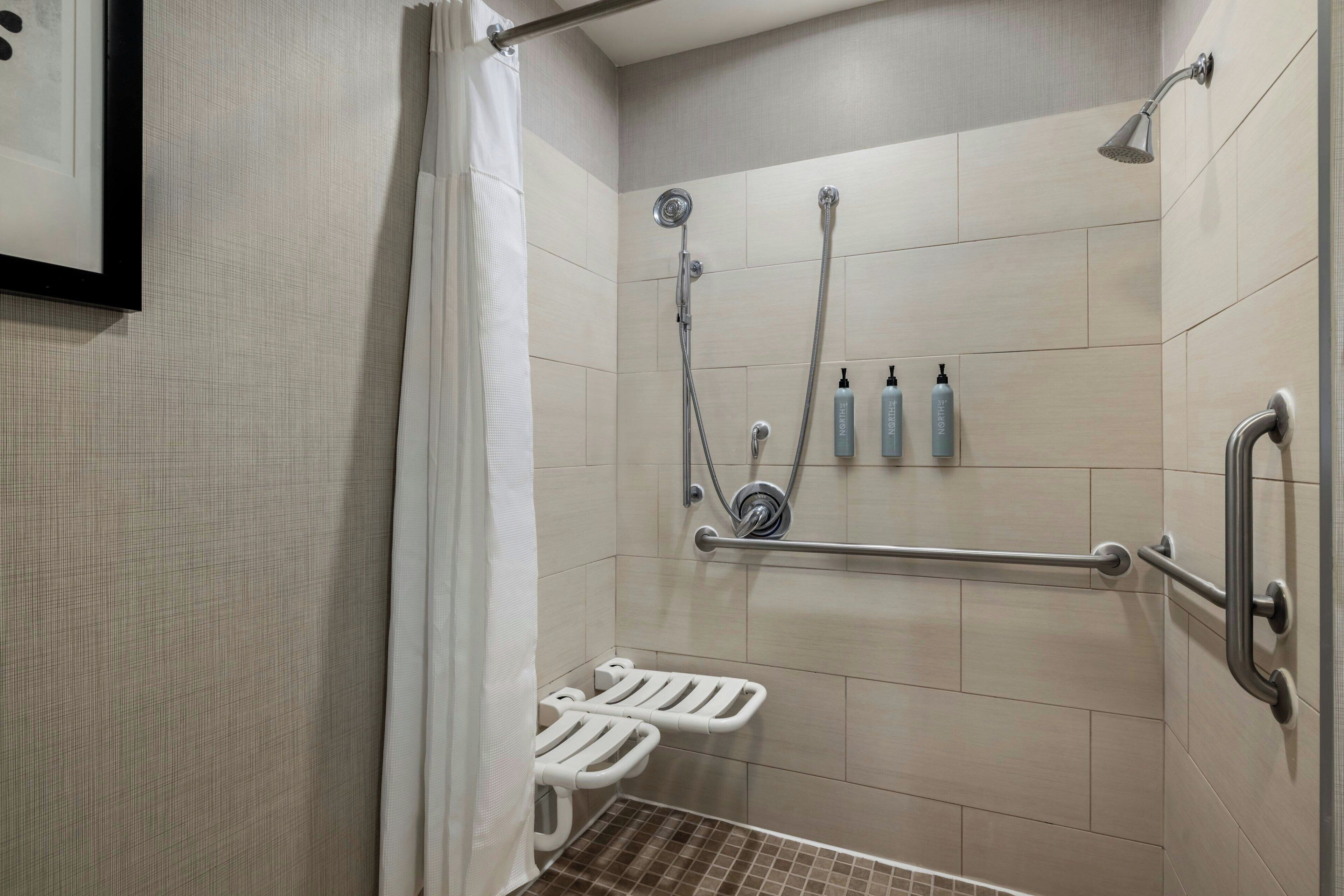 combined shower/bathtub, free toiletries, hair dryer, towels