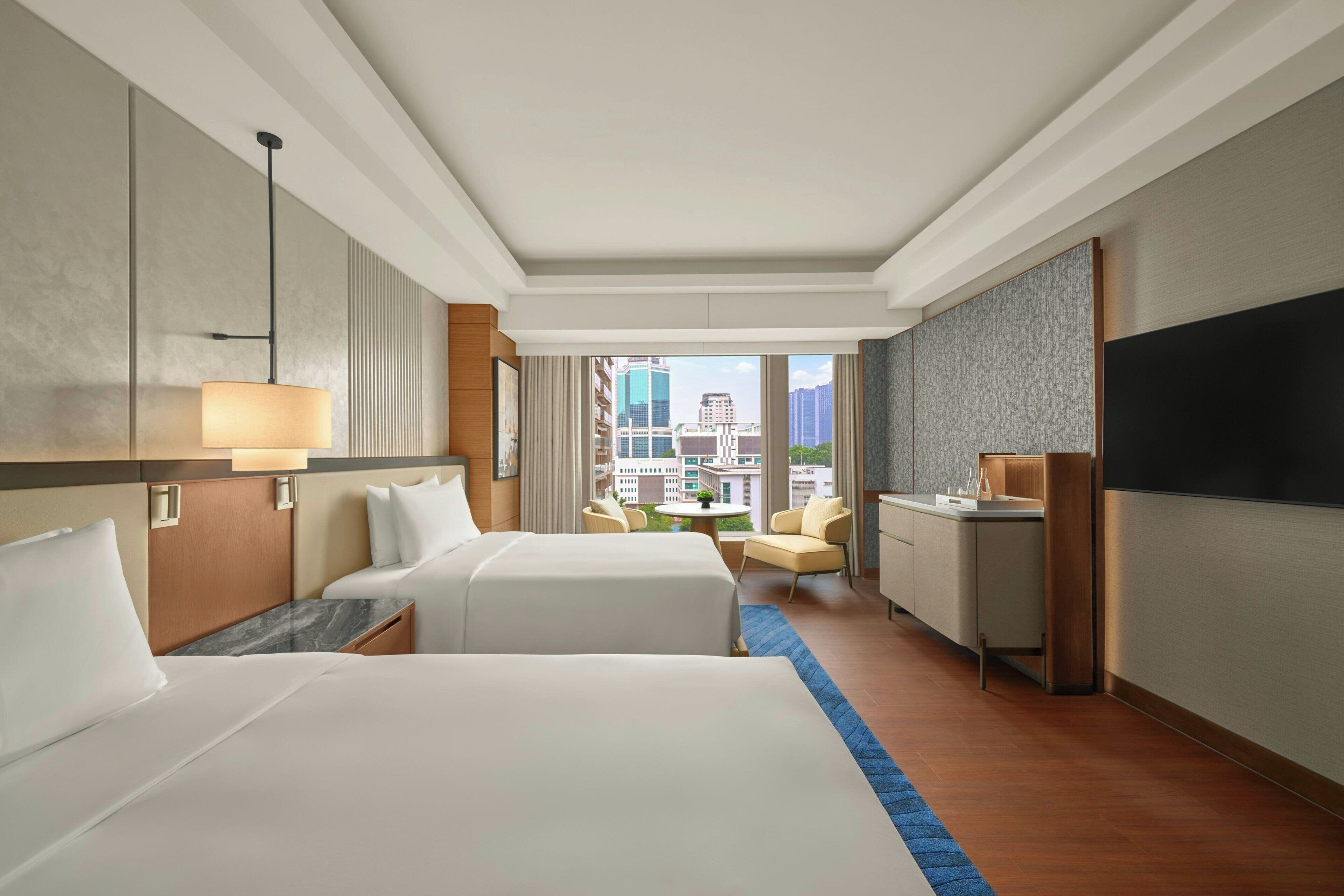 Premium bedding, memory-foam beds, minibar, in-room safe