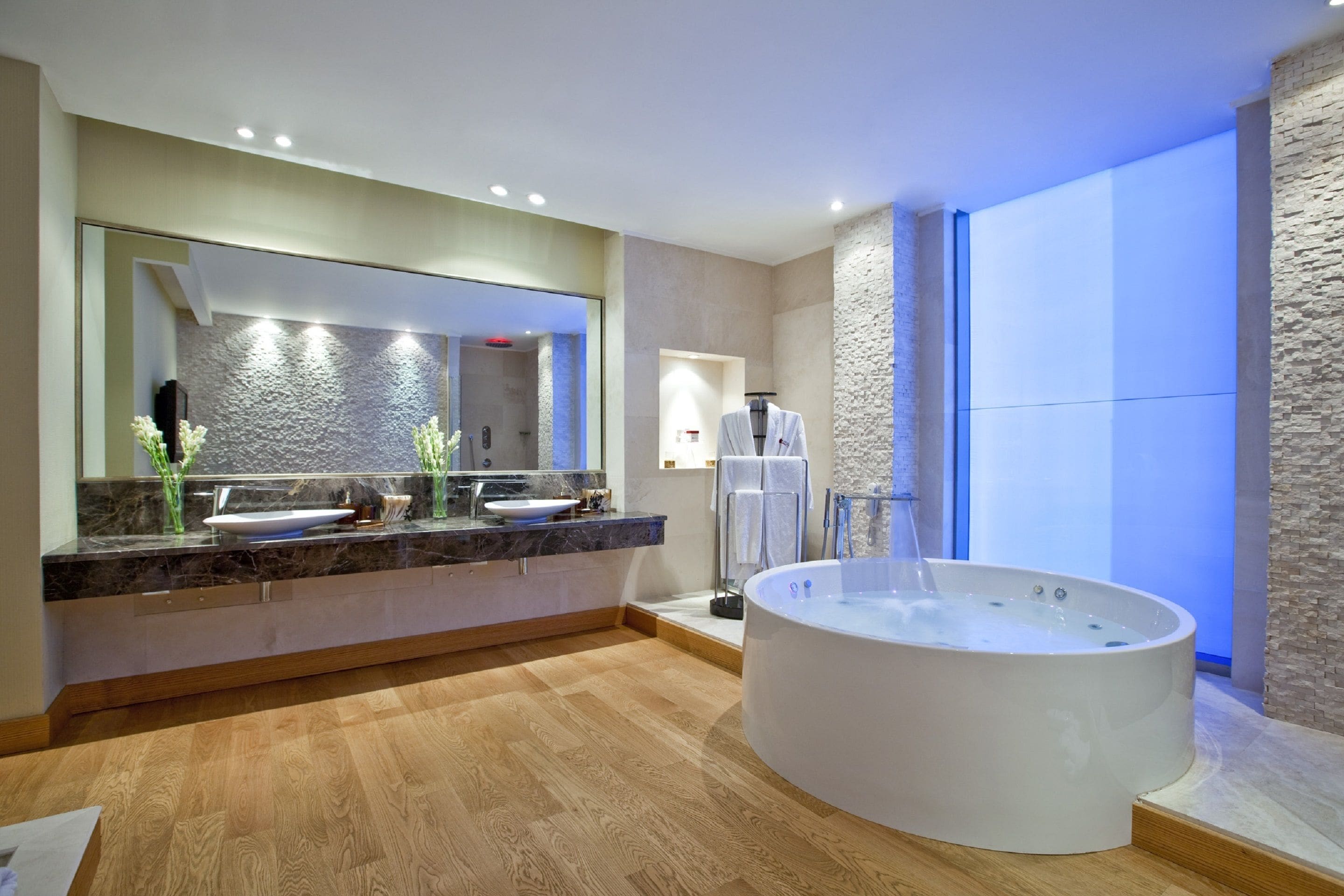 presidential room, 1 king bed, non smoking | bathroom | rainfall showerhead, eco-friendly toiletries, hair dryer, bathrobes