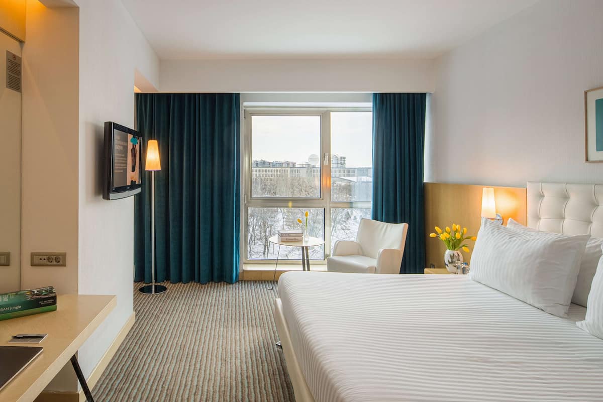 Standaard kamer, 1 eenpersoonsbed, niet-roken | Luxe beddengoed, een minibar, een kluis op de kamer, een bureau
