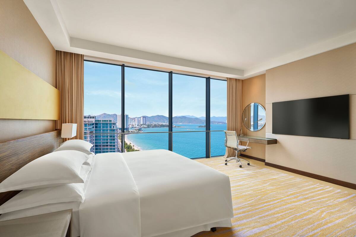 club apartment, 2 bedrooms, non smoking, ocean view | 1 bedroom, down duvets, pillow-top beds, minibar