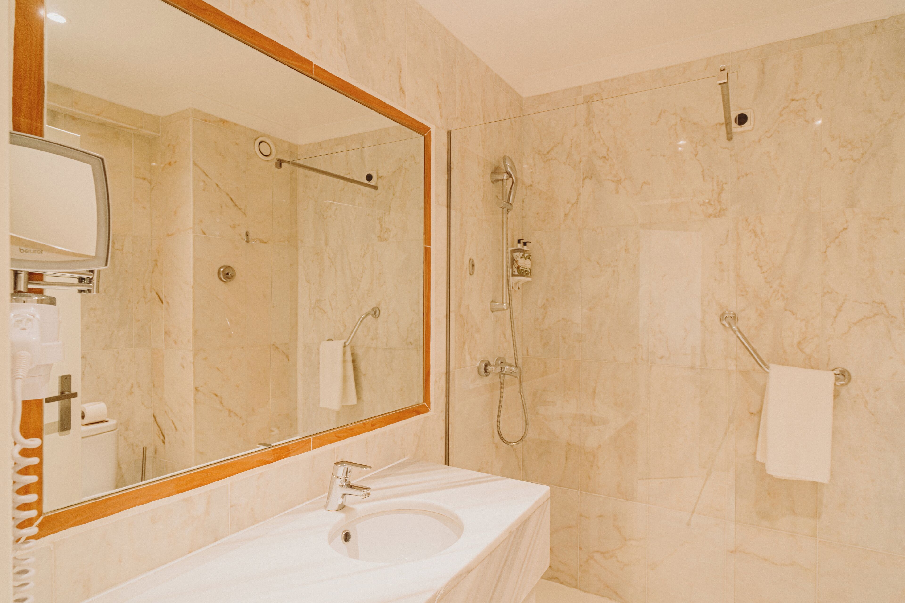 suite | bathroom | shower, rainfall showerhead, hair dryer, bidet