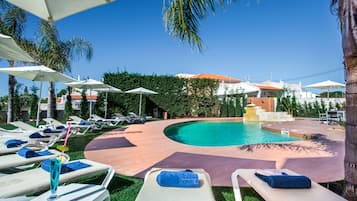 Outdoor pool, pool umbrellas, pool loungers