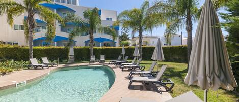 Outdoor pool, pool umbrellas, pool loungers