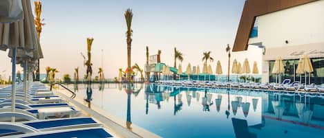 3 outdoor pools, pool umbrellas, sun loungers