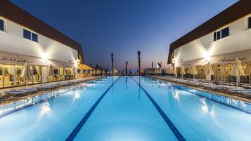 3 outdoor pools, pool umbrellas, pool loungers