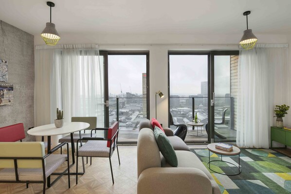 Executive Two Bedroom Suite | Living area | LCD TV