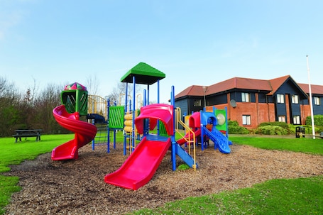 Children's play area - outdoor. Days Inn by Wyndham Stevenage North