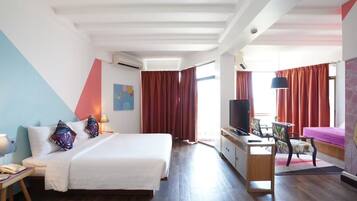 Deluxe Room | Minibar, in-room safe, WiFi (free), individually decorated