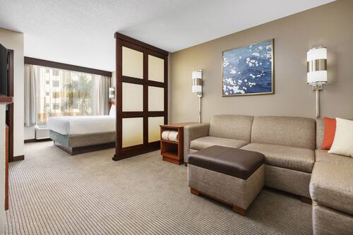 Down duvets, pillow-top beds, in-room safe, desk