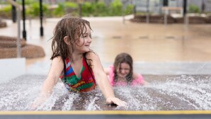 A water play area with a pool and a covered seating area. - Novotel Darwin Airport (Eaton)
