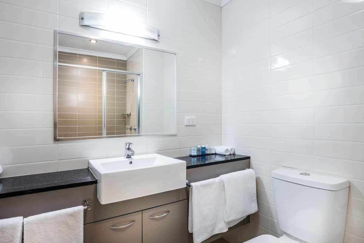 rainfall showerhead, eco-friendly toiletries, hair dryer, towels