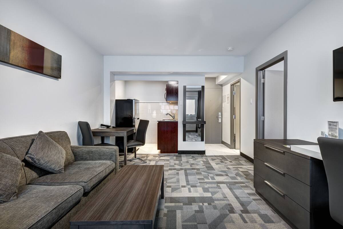 Superior Suite, 2 Double Beds, Kitchen | Living area | Flat-screen TV