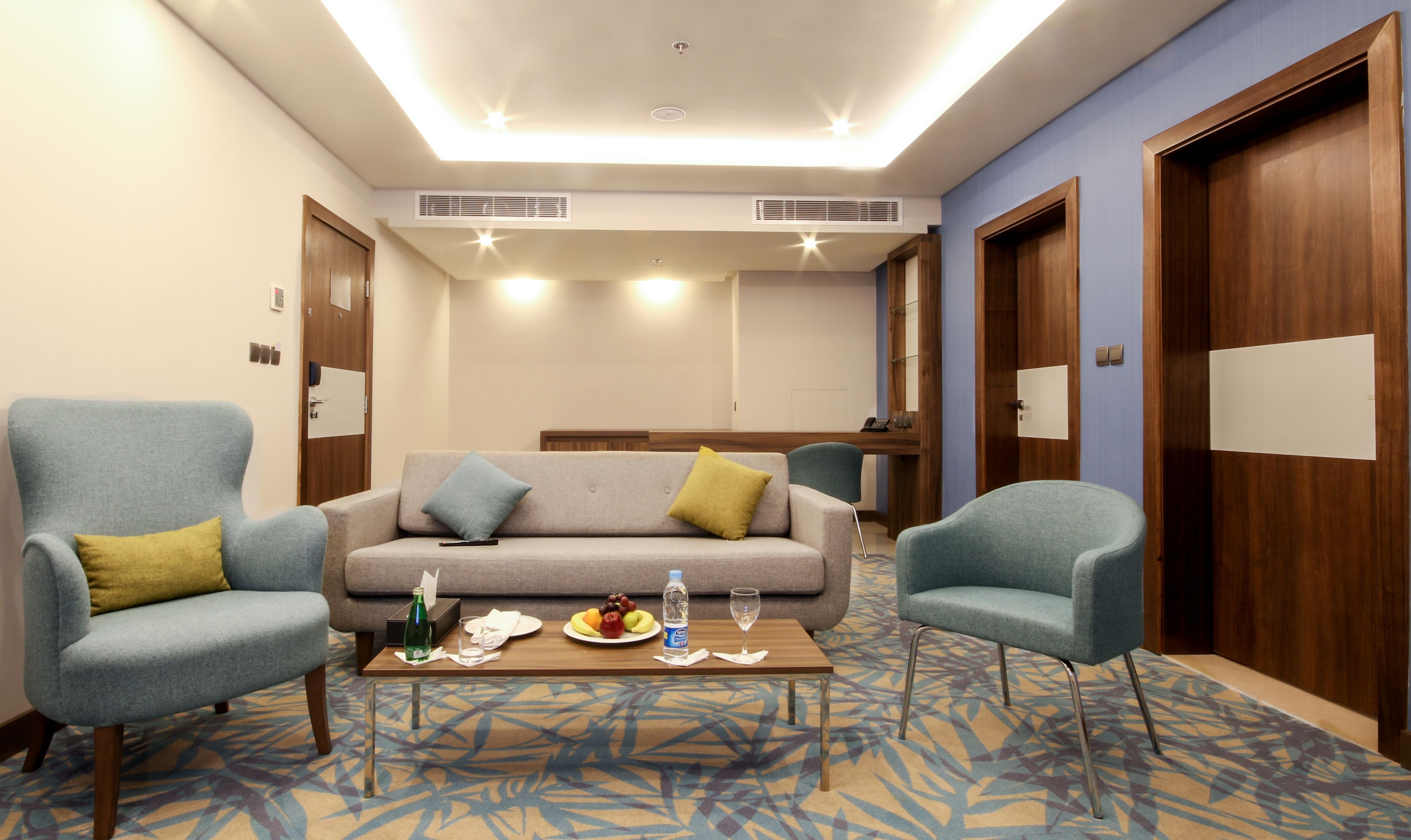 superior suite, 1 double bed with sofa bed, city view | living room | 46-inch lcd tv with cable channels, tv