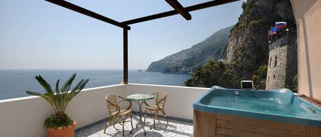 Romantic Studio Suite, 1 Bedroom, Terrace, Sea View | Minibar, in-room safe, desk, blackout drapes