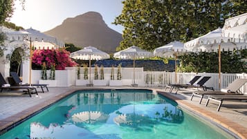 Outdoor pool, pool umbrellas, sun loungers