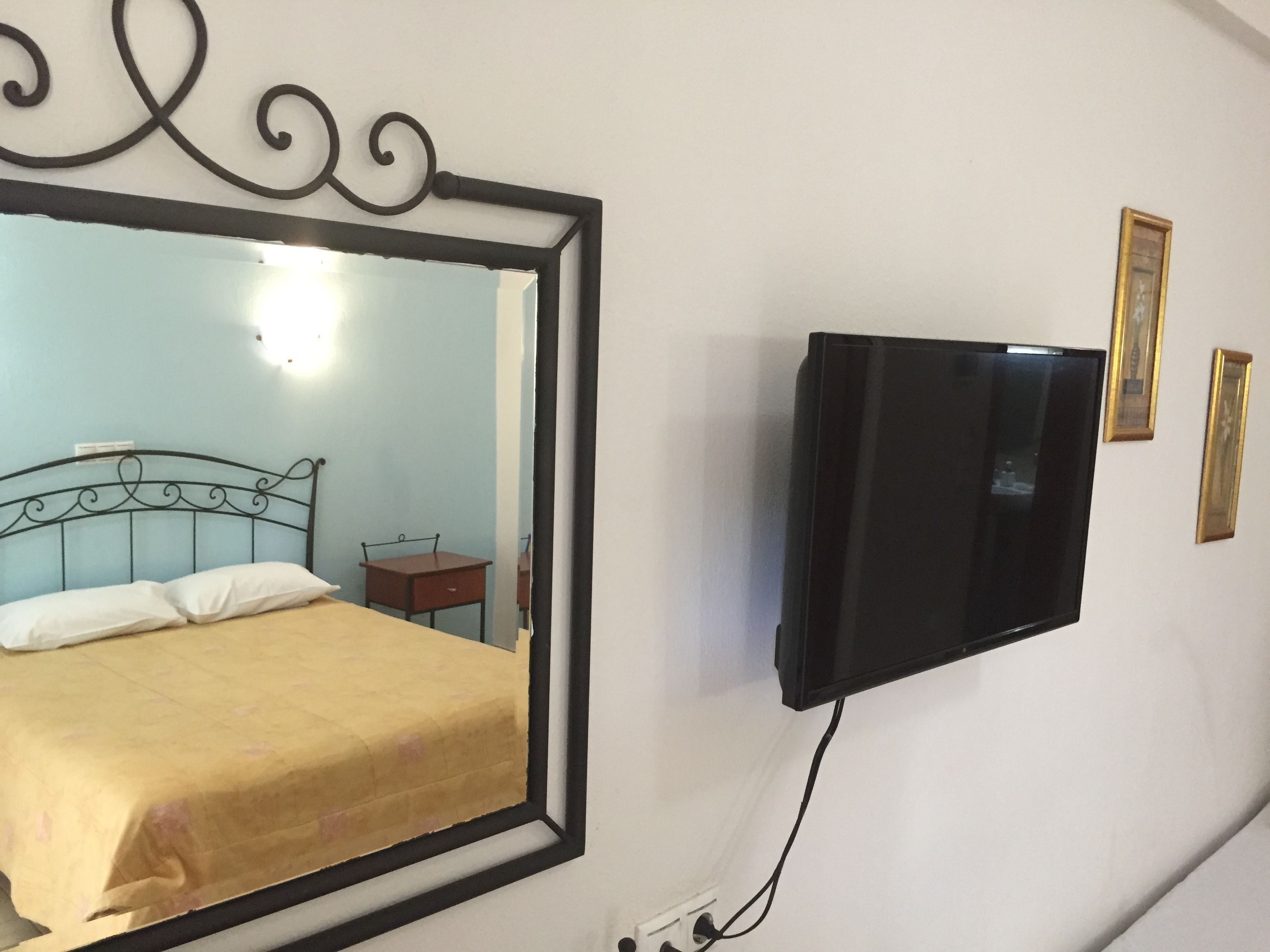 studio | living area | led tv, fireplace