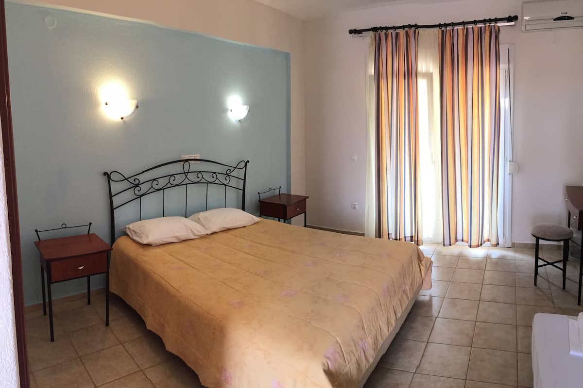 studio | living area | led tv, fireplace