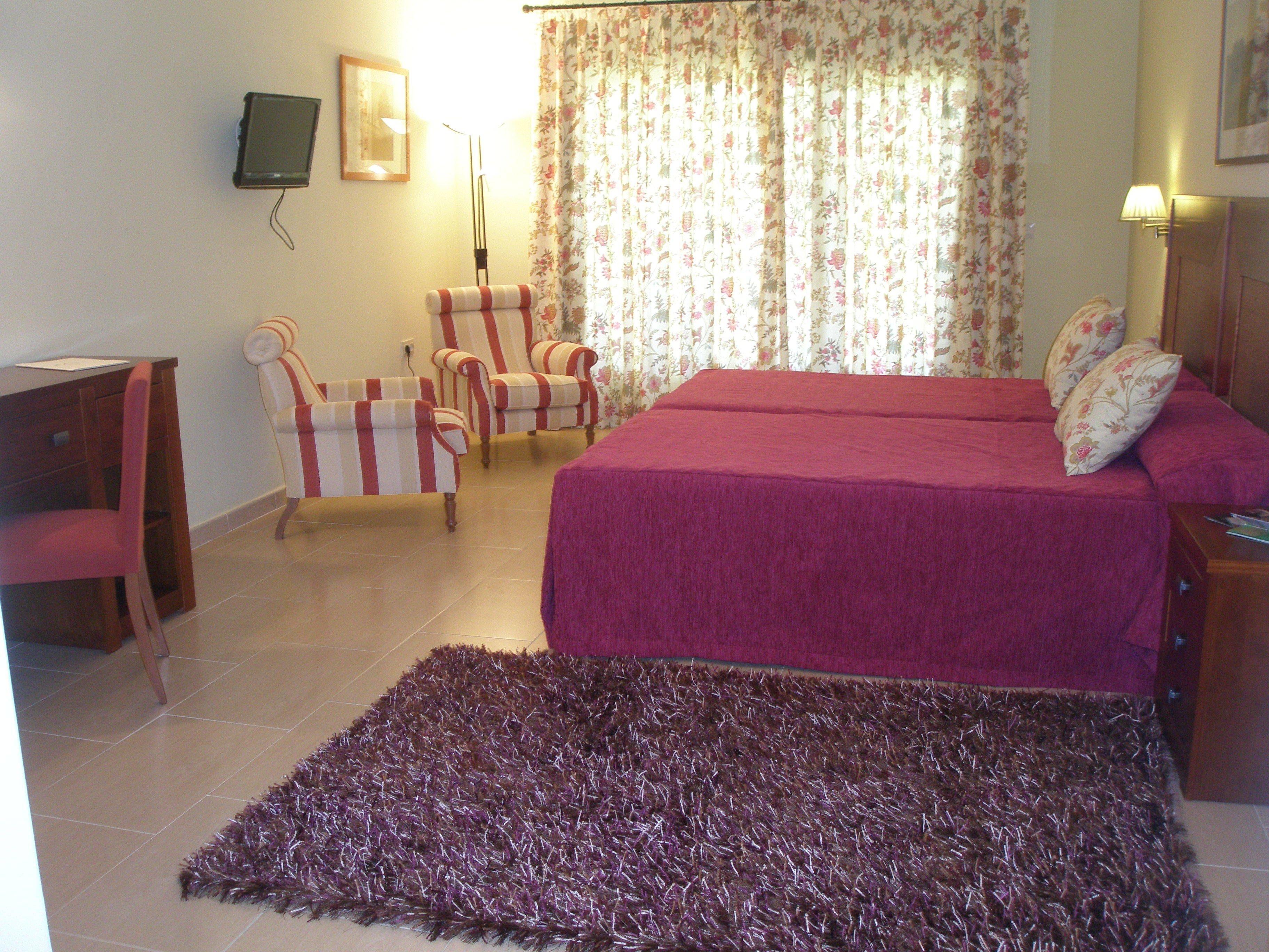 basic twin room | down duvets, minibar, in-room safe, desk