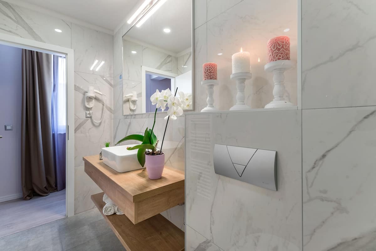 junior suite, mountain view | bathroom | shower, hair dryer, towels