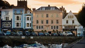A row of buildings with a prominent building labeled "ROYAL CASTLE" in the center. - Royal Castle Hotel (Dartmouth)