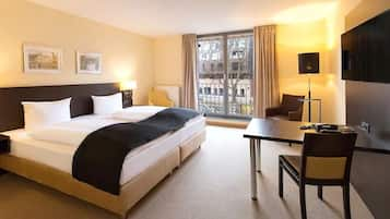 Premium bedding, free minibar, in-room safe, desk