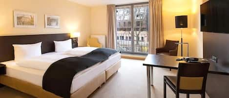 Premium bedding, free minibar, in-room safe, desk