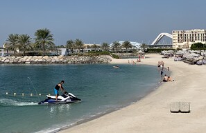 Playa privada, arena blanca, cabañas de playa y tumbonas