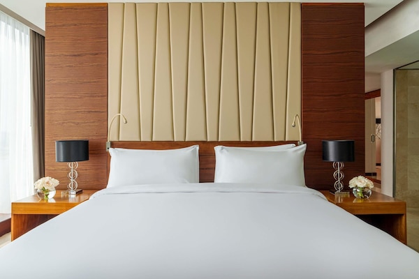 Literie hypoallergénique, minibar, coffres-forts dans les chambres