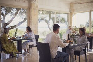 Breakfast, lunch, dinner served; ocean views