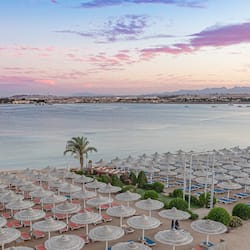 On the beach, sun-loungers, beach umbrellas, beach towels