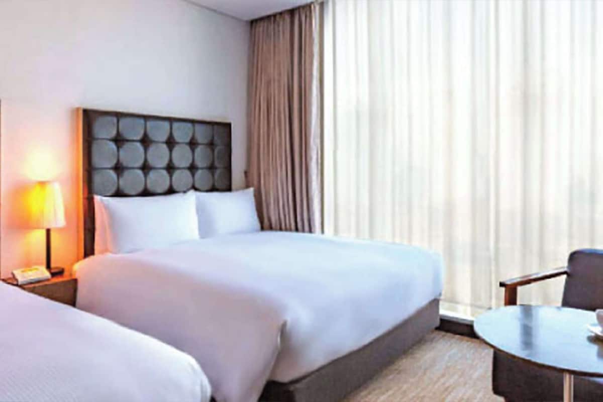 Luxe beddengoed, een minibar met enkele gratis items